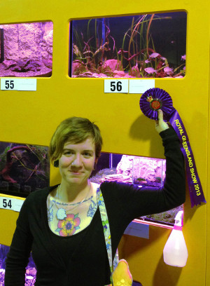 Rose Levanti-Niblock with her champion Australasian native fish at the Ekka, 2013